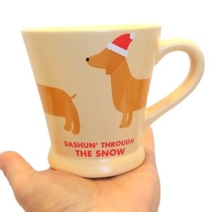 Dachshund Santa Hat "Dashun' Through The Snow"  Coffee Mug by Indigo